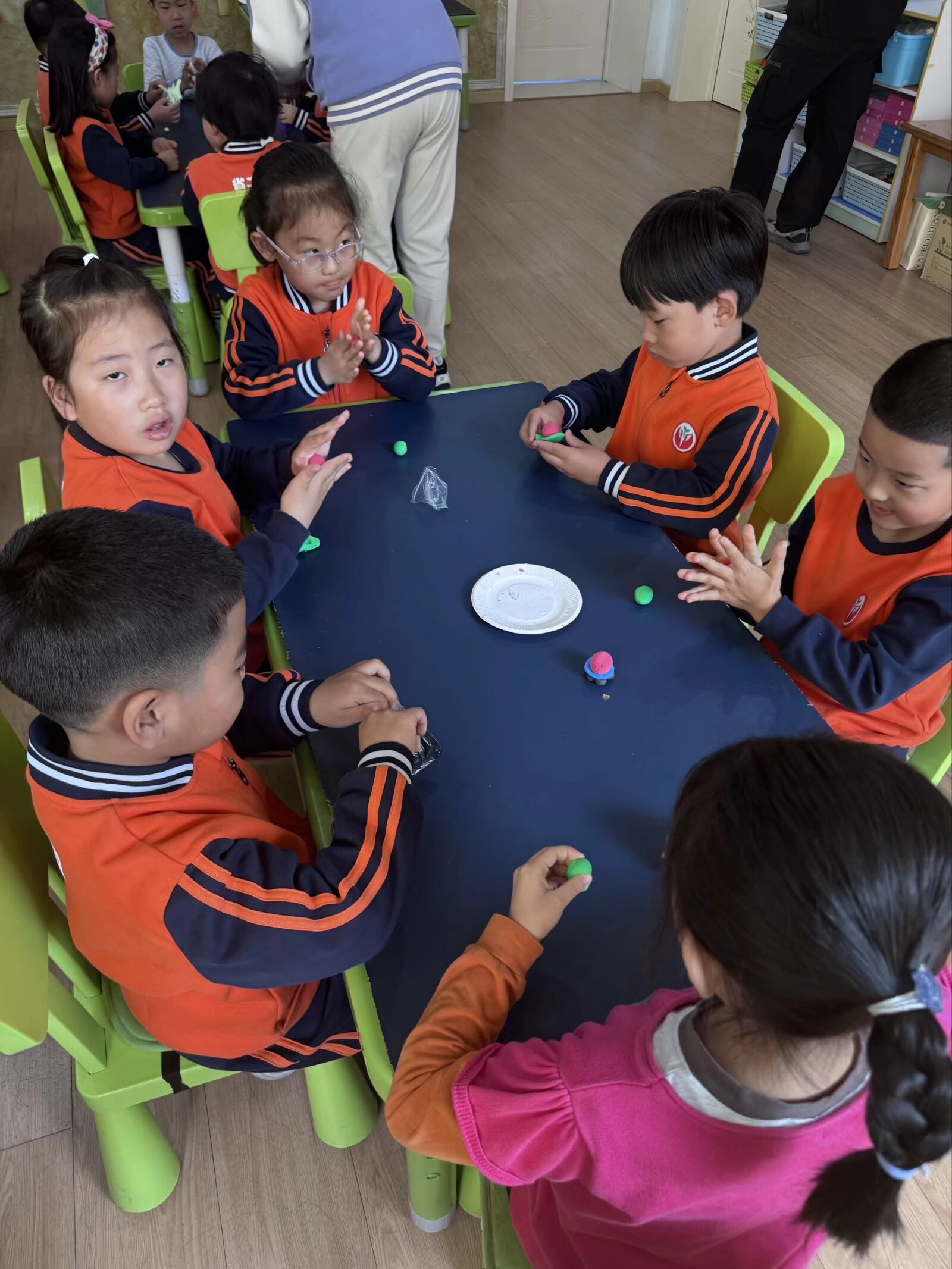 Kindergarten children participating in a hands-on science activity