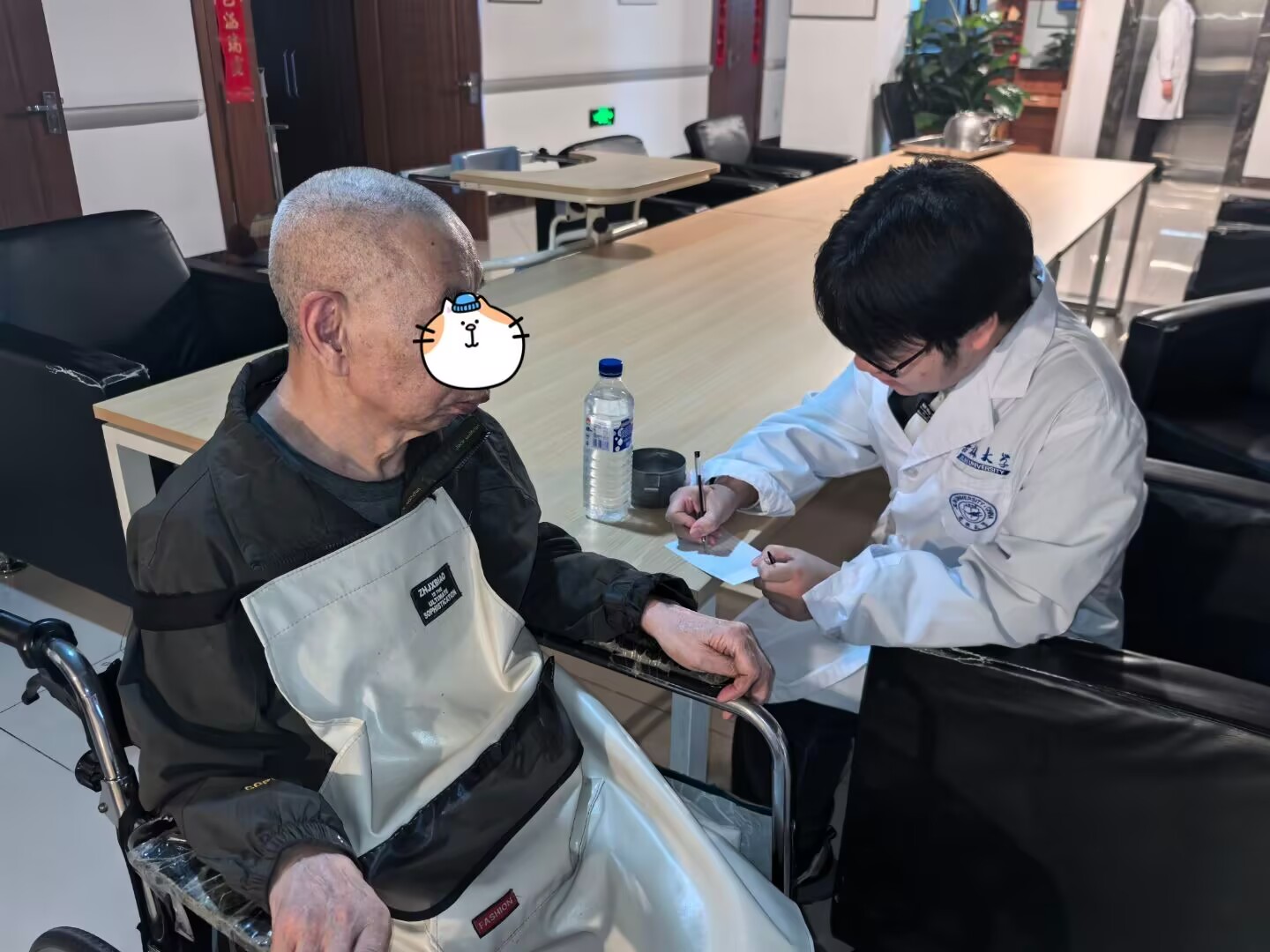 A volunteer discussing printed materials with an older adult