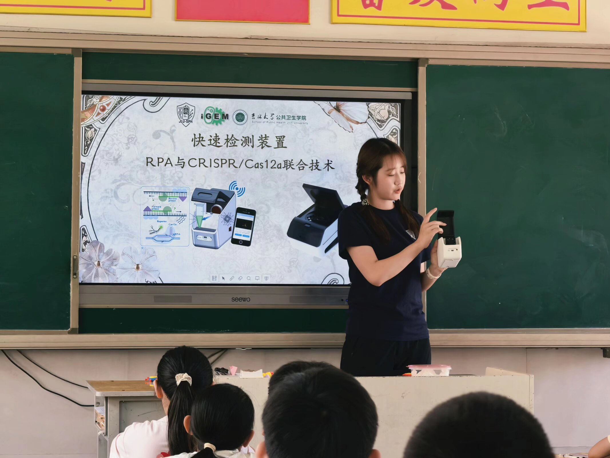 A presenter introducing respiratory-detection ideas to the class