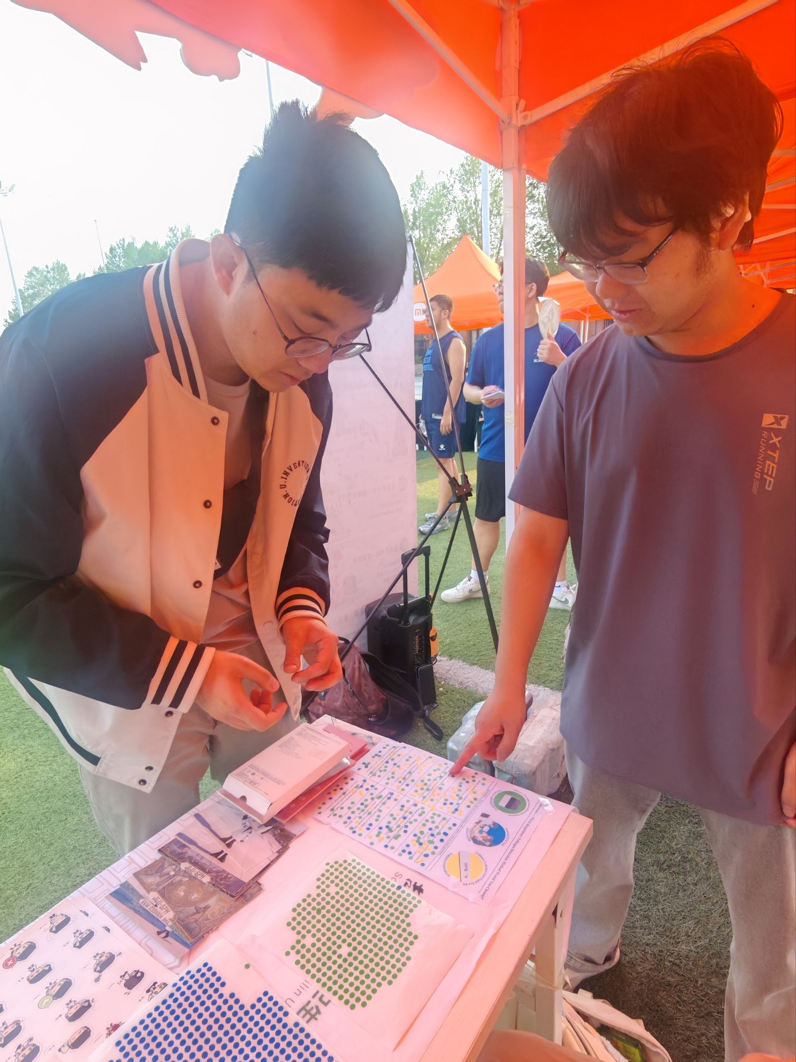 A visitor adding a choice to the interactive voting board