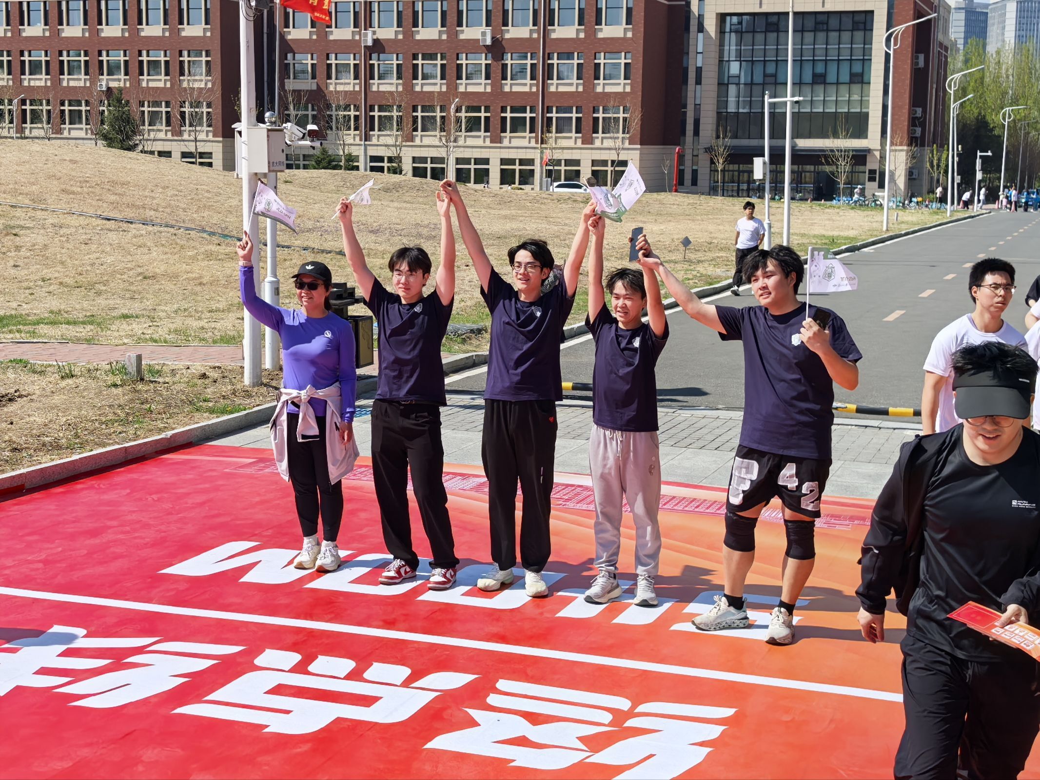 Runners greeting the team at the event area